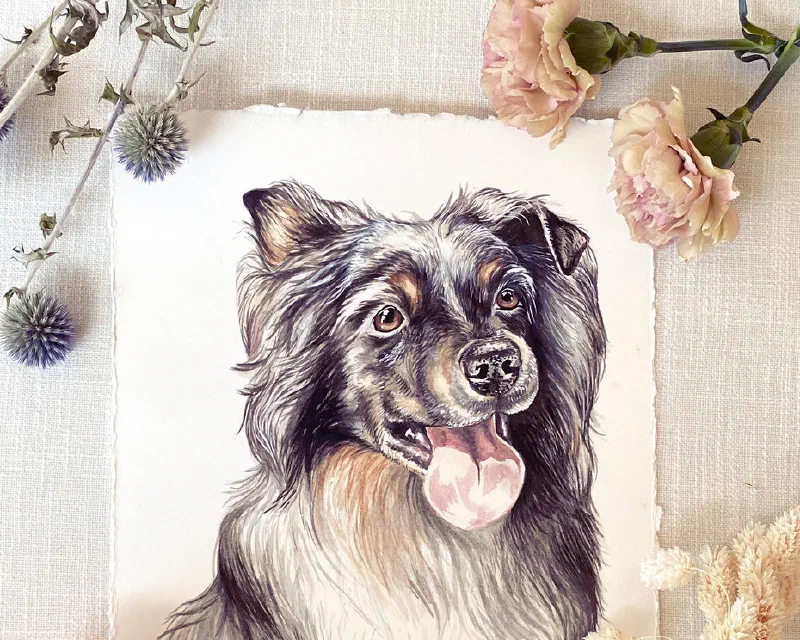 Watercolor portrait of a fluffy black-and-tan dog