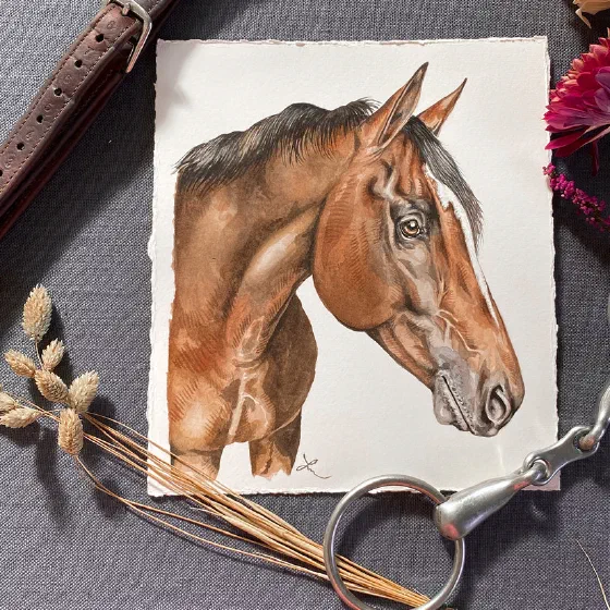 Watercolor horse portrait styled with flowers and a bridle bit